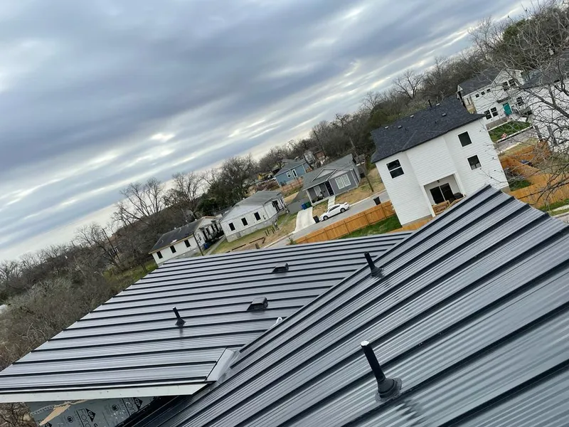Standing seam metal roof panels with vents for Skylight Repair in Itasca